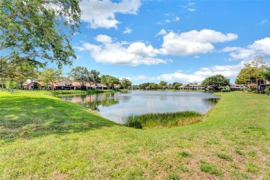 Beautiful 3 bed, 2 bath corner unit townhome in The Lakes of on Deer Creek Golf Club in Florida - for sale on GolfHomes.com, golf home, golf lot