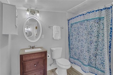 This Salt Box-inspired beauty, echoes the cozy charm of early on Tides Inn Par 3 Course in Virginia - for sale on GolfHomes.com, golf home, golf lot