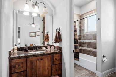 Beautiful single-family home sits overlooking the green of Hole on The Club At Comanche Trace in Texas - for sale on GolfHomes.com, golf home, golf lot