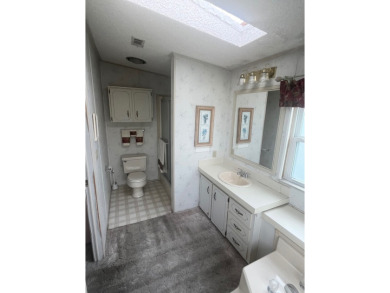 **Beautiful Home on the 17th green in Pine Lakes Country Club** on Pine Lakes Country Club in Florida - for sale on GolfHomes.com, golf home, golf lot