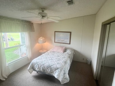 **Beautiful Home on the 17th green in Pine Lakes Country Club** on Pine Lakes Country Club in Florida - for sale on GolfHomes.com, golf home, golf lot