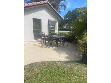 Beautiful 3 bed, 2 bath corner unit townhome in The Lakes of on Deer Creek Golf Club in Florida - for sale on GolfHomes.com, golf home, golf lot