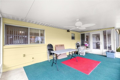 This spacious, end unit Bostonian is located in the much sought on On Top of the World Golf Course in Florida - for sale on GolfHomes.com, golf home, golf lot