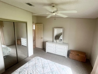 **Beautiful Home on the 17th green in Pine Lakes Country Club** on Pine Lakes Country Club in Florida - for sale on GolfHomes.com, golf home, golf lot