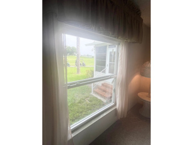 **Beautiful Home on the 17th green in Pine Lakes Country Club** on Pine Lakes Country Club in Florida - for sale on GolfHomes.com, golf home, golf lot
