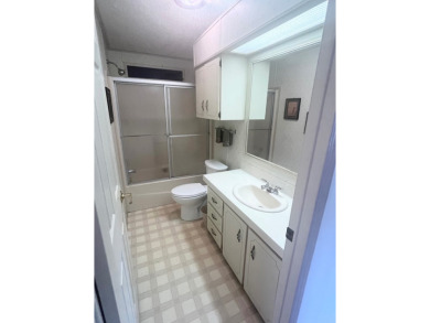 **Beautiful Home on the 17th green in Pine Lakes Country Club** on Pine Lakes Country Club in Florida - for sale on GolfHomes.com, golf home, golf lot