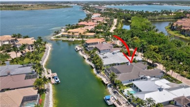 Sun-Soaked Sophistication on the Shores of Miromar Lakes! Tucked on Miromar Lakes Golf Club in Florida - for sale on GolfHomes.com, golf home, golf lot