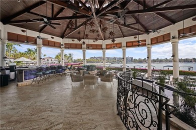 Sun-Soaked Sophistication on the Shores of Miromar Lakes! Tucked on Miromar Lakes Golf Club in Florida - for sale on GolfHomes.com, golf home, golf lot