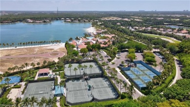 Sun-Soaked Sophistication on the Shores of Miromar Lakes! Tucked on Miromar Lakes Golf Club in Florida - for sale on GolfHomes.com, golf home, golf lot