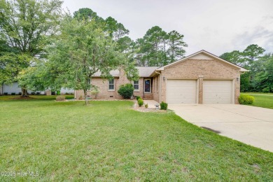 Welcome to 1513 Caracara Drive - Comfort, Style & Security in on Harbour Point Golf Club in North Carolina - for sale on GolfHomes.com, golf home, golf lot
