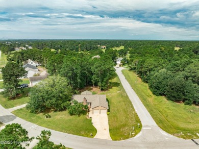 Welcome to 1513 Caracara Drive - Comfort, Style & Security in on Harbour Point Golf Club in North Carolina - for sale on GolfHomes.com, golf home, golf lot