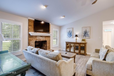 Welcome to 1513 Caracara Drive - Comfort, Style & Security in on Harbour Point Golf Club in North Carolina - for sale on GolfHomes.com, golf home, golf lot