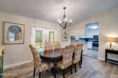 Welcome to 1513 Caracara Drive - Comfort, Style & Security in on Harbour Point Golf Club in North Carolina - for sale on GolfHomes.com, golf home, golf lot