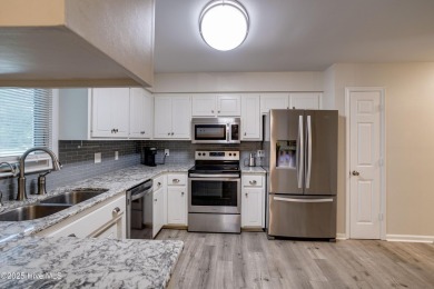 Welcome to 1513 Caracara Drive - Comfort, Style & Security in on Harbour Point Golf Club in North Carolina - for sale on GolfHomes.com, golf home, golf lot