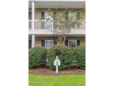 Don't Miss This First Floor - Golf  Pond View Condo in Sandpiper on Sandpiper Bay Golf and Country Club in North Carolina - for sale on GolfHomes.com, golf home, golf lot