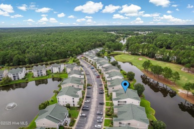 Don't Miss This First Floor - Golf  Pond View Condo in Sandpiper on Sandpiper Bay Golf and Country Club in North Carolina - for sale on GolfHomes.com, golf home, golf lot