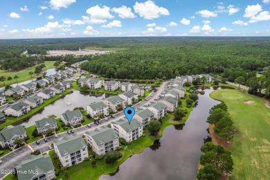Don't Miss This First Floor - Golf  Pond View Condo in Sandpiper on Sandpiper Bay Golf and Country Club in North Carolina - for sale on GolfHomes.com, golf home, golf lot