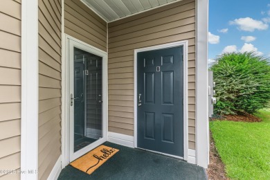 Don't Miss This First Floor - Golf  Pond View Condo in Sandpiper on Sandpiper Bay Golf and Country Club in North Carolina - for sale on GolfHomes.com, golf home, golf lot