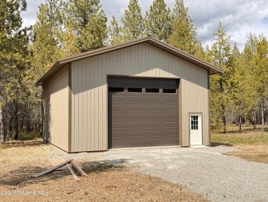 MOVE IN READY! Stunning custom home situated on 4.8 treed acres on Twin Lakes Village Golf Course in Idaho - for sale on GolfHomes.com, golf home, golf lot