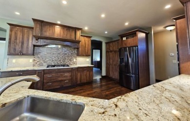 Enjoy the stunning views in this exquisite home which overlooks on Miles City Town and Country Club in Montana - for sale on GolfHomes.com, golf home, golf lot