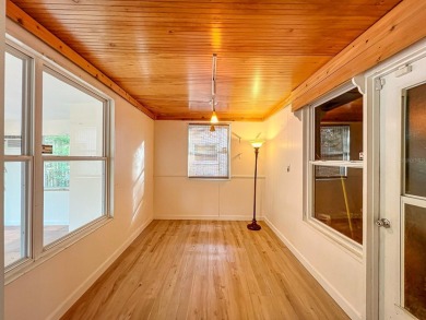 Charming Single-Family Home in Dunedin, FL - A Perfect Blend of on The Dunedin Country Club in Florida - for sale on GolfHomes.com, golf home, golf lot