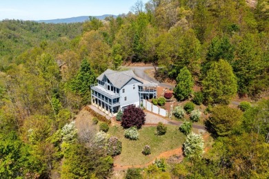 Envision sophistication nestled within the prestigious gated on Chatuge Shores Golf Course in North Carolina - for sale on GolfHomes.com, golf home, golf lot