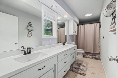 Don't miss this beautifully remodeled 4-bedroom, 3-bath home on Bella Vista Country Club - Berksdale in Arkansas - for sale on GolfHomes.com, golf home, golf lot