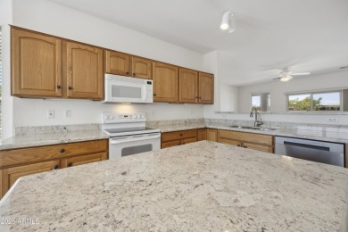 Beautifully maintained 2BR, 2BA plus den/office Daybreak model on Lone Tree Golf Club in Arizona - for sale on GolfHomes.com, golf home, golf lot