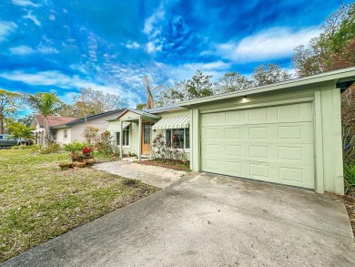 Charming Single-Family Home in Dunedin, FL - A Perfect Blend of on The Dunedin Country Club in Florida - for sale on GolfHomes.com, golf home, golf lot