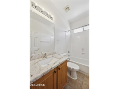 Beautifully maintained 2BR, 2BA plus den/office Daybreak model on Lone Tree Golf Club in Arizona - for sale on GolfHomes.com, golf home, golf lot