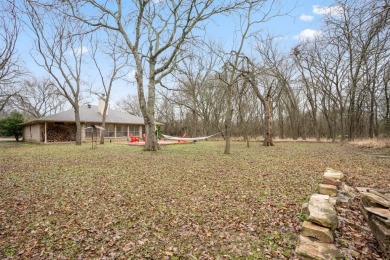 Welcome to this charming 3-bedroom, 2-bathroom home located in on White Bluff Resort - New Course in Texas - for sale on GolfHomes.com, golf home, golf lot