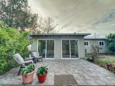 Charming Single-Family Home in Dunedin, FL - A Perfect Blend of on The Dunedin Country Club in Florida - for sale on GolfHomes.com, golf home, golf lot