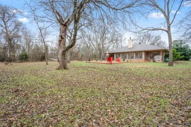 Welcome to this charming 3-bedroom, 2-bathroom home located in on White Bluff Resort - New Course in Texas - for sale on GolfHomes.com, golf home, golf lot