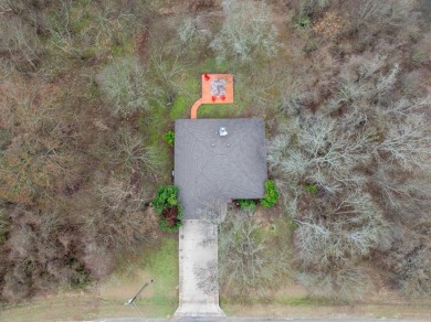 Welcome to this charming 3-bedroom, 2-bathroom home located in on White Bluff Resort - New Course in Texas - for sale on GolfHomes.com, golf home, golf lot