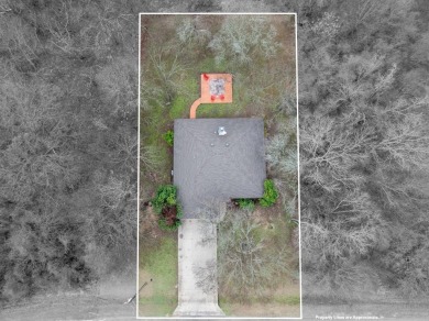 Welcome to this charming 3-bedroom, 2-bathroom home located in on White Bluff Resort - New Course in Texas - for sale on GolfHomes.com, golf home, golf lot