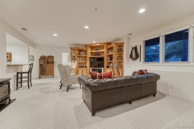 Tucked away in the trees for ultimate privacy, this beautifully on Castle Pines Golf Club in Colorado - for sale on GolfHomes.com, golf home, golf lot
