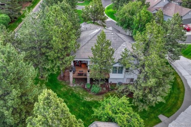 Tucked away in the trees for ultimate privacy, this beautifully on Castle Pines Golf Club in Colorado - for sale on GolfHomes.com, golf home, golf lot