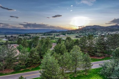 Tucked away in the trees for ultimate privacy, this beautifully on Castle Pines Golf Club in Colorado - for sale on GolfHomes.com, golf home, golf lot