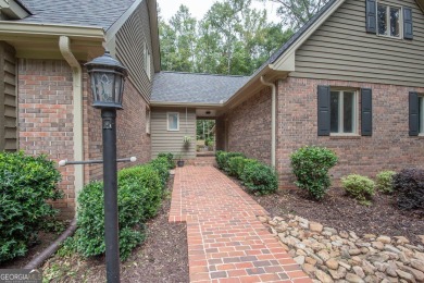 PERFECT LOCATION and MOVE-IN READY with wonderful curb appeal on on Canongate At Flat Creek Club in Georgia - for sale on GolfHomes.com, golf home, golf lot