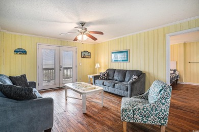 Welcome to your dream getaway! This stunning 6-bedroom on Beachwood Golf Club in South Carolina - for sale on GolfHomes.com, golf home, golf lot