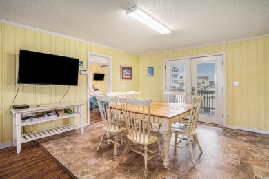 Welcome to your dream getaway! This stunning 6-bedroom on Beachwood Golf Club in South Carolina - for sale on GolfHomes.com, golf home, golf lot