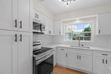 Offered for sale is this incredible, renovated, 2-bedroom on Pasadena Yacht and Country Club in Florida - for sale on GolfHomes.com, golf home, golf lot