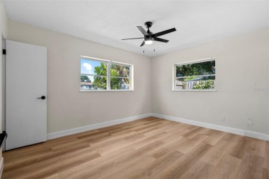Offered for sale is this incredible, renovated, 2-bedroom on Pasadena Yacht and Country Club in Florida - for sale on GolfHomes.com, golf home, golf lot