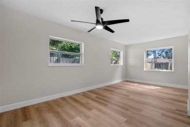 Offered for sale is this incredible, renovated, 2-bedroom on Pasadena Yacht and Country Club in Florida - for sale on GolfHomes.com, golf home, golf lot