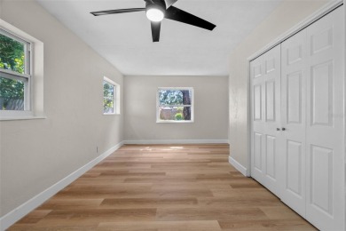 Offered for sale is this incredible, renovated, 2-bedroom on Pasadena Yacht and Country Club in Florida - for sale on GolfHomes.com, golf home, golf lot