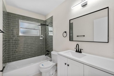 Offered for sale is this incredible, renovated, 2-bedroom on Pasadena Yacht and Country Club in Florida - for sale on GolfHomes.com, golf home, golf lot