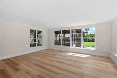 Offered for sale is this incredible, renovated, 2-bedroom on Pasadena Yacht and Country Club in Florida - for sale on GolfHomes.com, golf home, golf lot