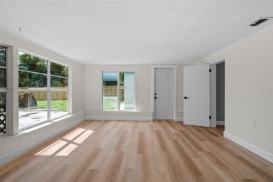 Offered for sale is this incredible, renovated, 2-bedroom on Pasadena Yacht and Country Club in Florida - for sale on GolfHomes.com, golf home, golf lot