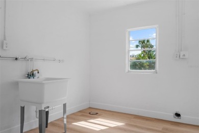 Offered for sale is this incredible, renovated, 2-bedroom on Pasadena Yacht and Country Club in Florida - for sale on GolfHomes.com, golf home, golf lot