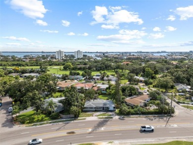 Offered for sale is this incredible, renovated, 2-bedroom on Pasadena Yacht and Country Club in Florida - for sale on GolfHomes.com, golf home, golf lot